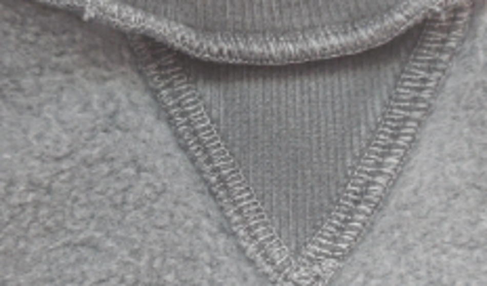 Veste, čemu služi trikotnik na majicah?