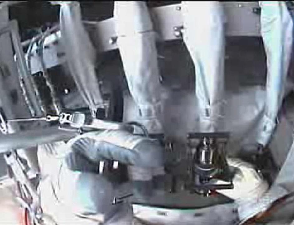 Popravilo ISS astronavta