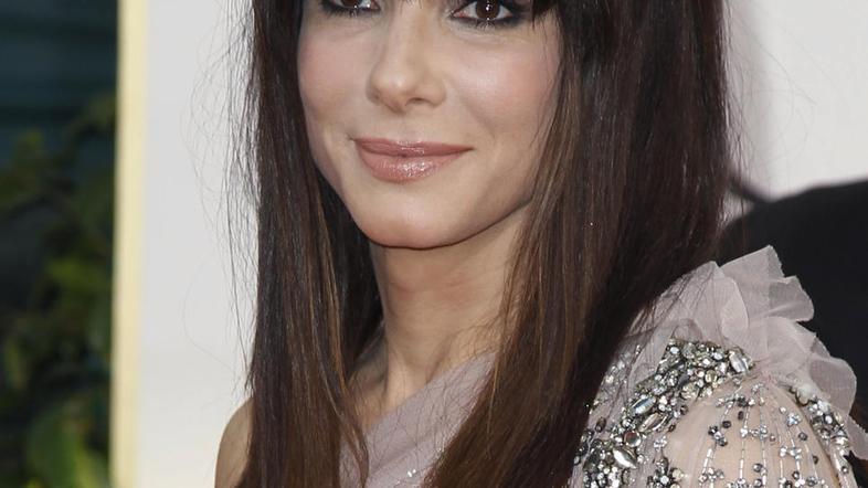 Edini moški v Sandrinem življenju je trenutno njen sin Louis. (Foto: Reuters)