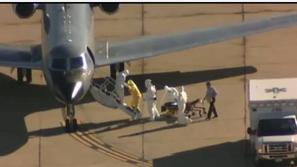 Spremljevalec okužene pacinetke z ebolo