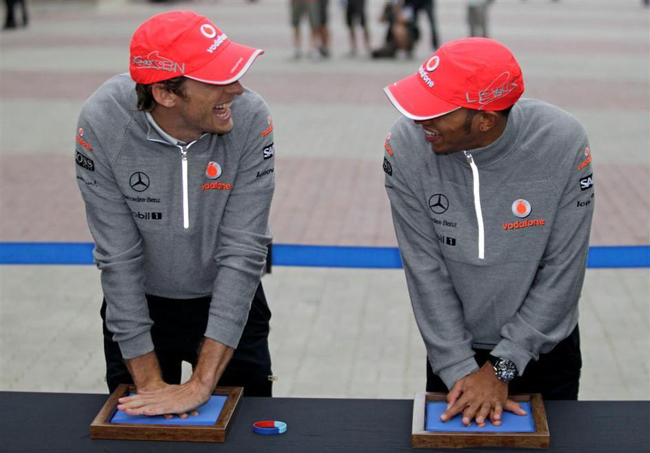 Jenson Button in Lewis Hamilton