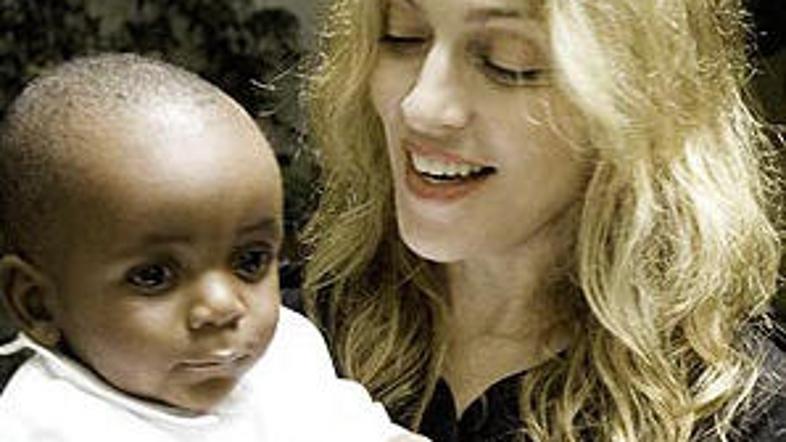 Madonna je posvojenca našla pred tremi leti v sirotišnici Mchinji. Foto: AFP