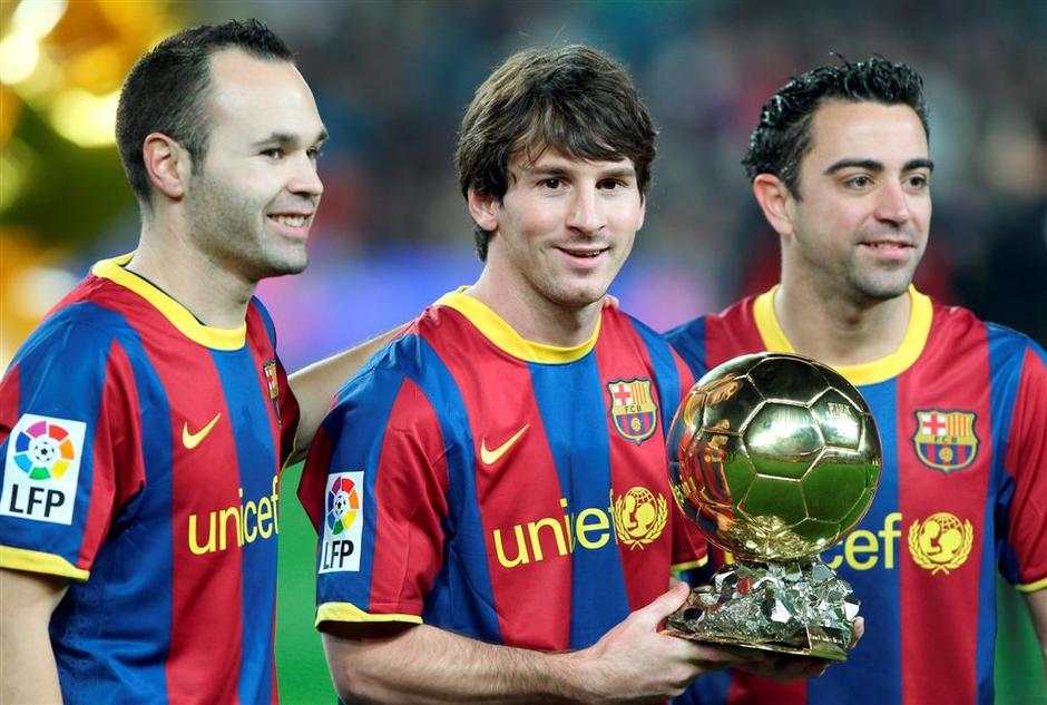 Lionel Messi je leta 2011 osvojil zlato žogo pred soigralcema Xavijem Hernándezo | Avtor: EPA