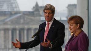 razno 26.02.13. German Chancellor Angela Merkel and U.S. Secretary of State John